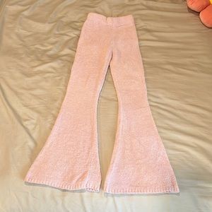 small pink and fluffy flared pants